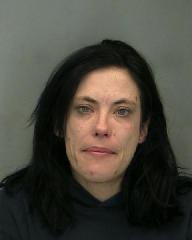Roxanne FLANSBERRY wanted for Fraud