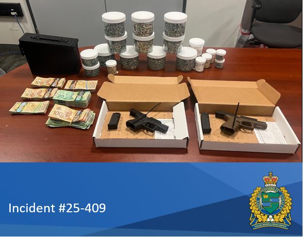 photo of guns, drugs, and Canadian currency